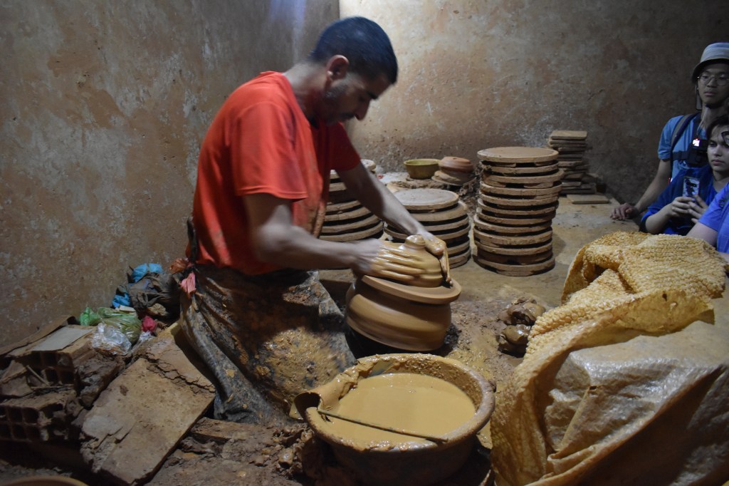 Man making Tajins out of clay, He says he makes 200-300 a day