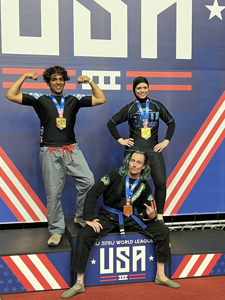 I am on the left - my teammates on right and below who also won gold in their divisions.